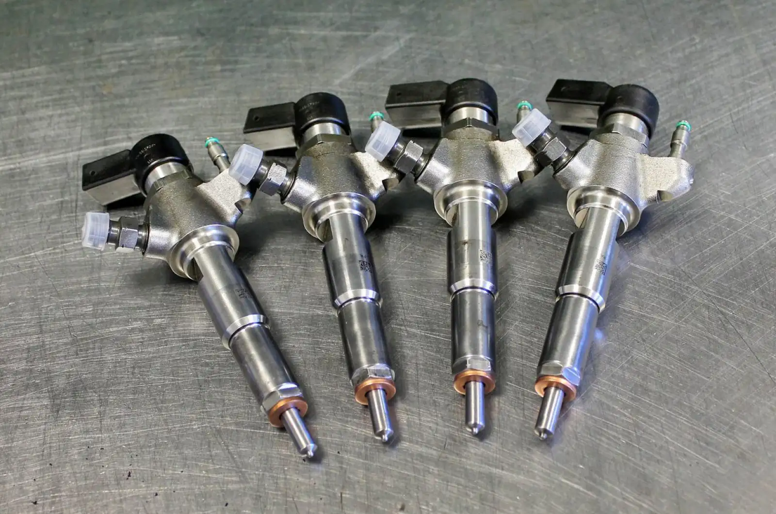 Отличия топливных форсунок. Форсунка Siemens common Rail. Форсунки КАМАЗ евро 5 комон рейл. Ремкомплект дизельной форсунки Сименс. Форсунка топливная КАМАЗ евро 4 Коммон рейл.